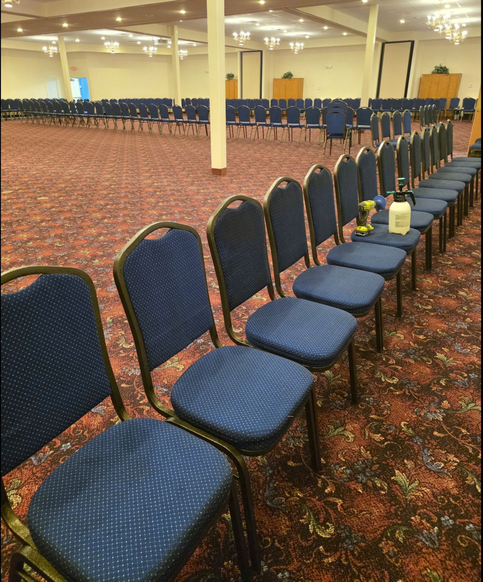 Banquet hall chair upholstery cleaning in progress
